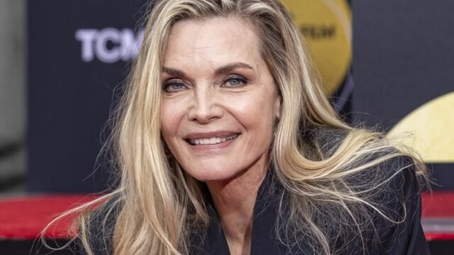 michelle-pfeiffer-smiling-at-her-walk-of-fame-ceremony.jpg